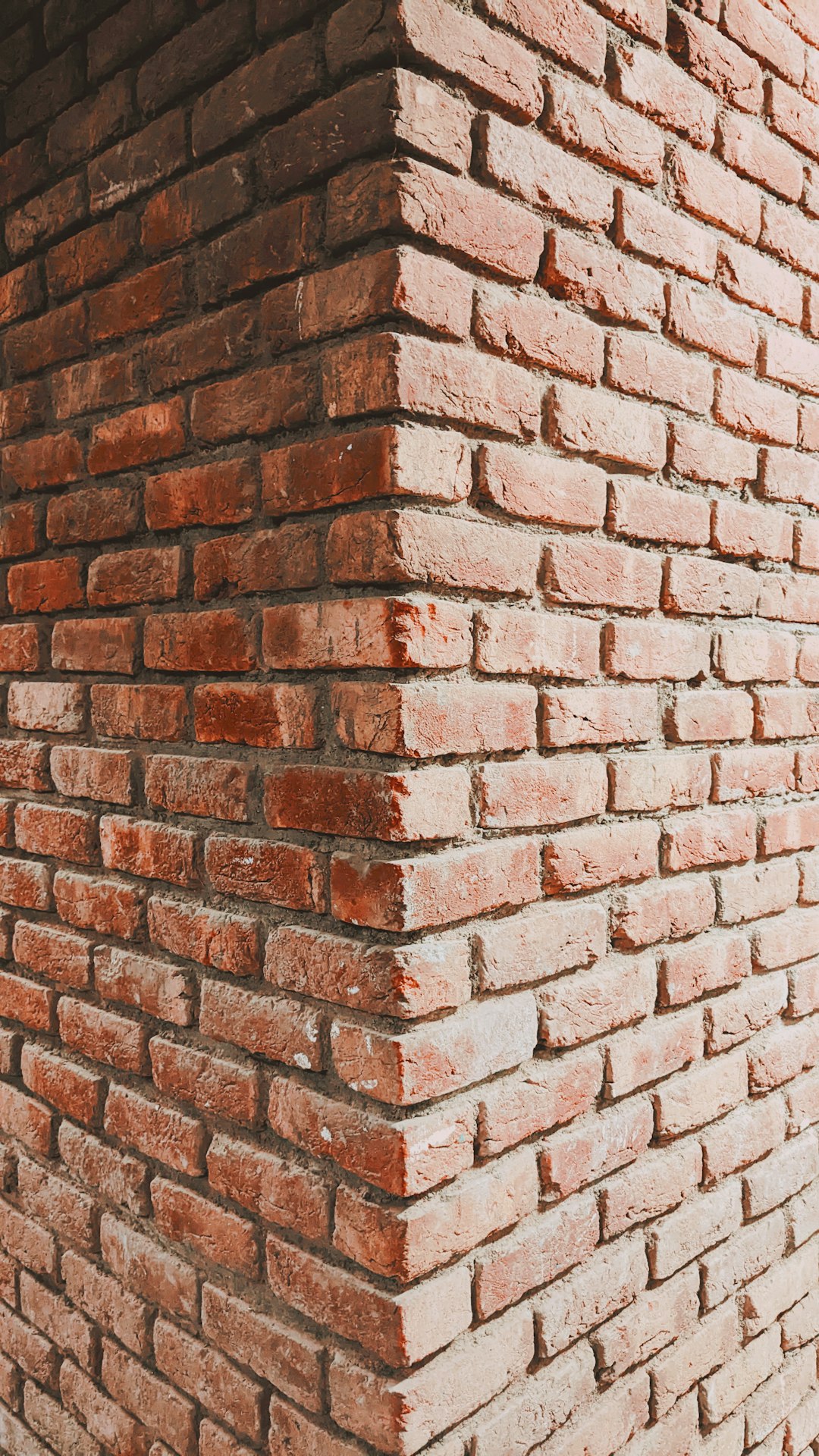 a-brick-wall-with-a-hole-in-it-0gnst1bktua